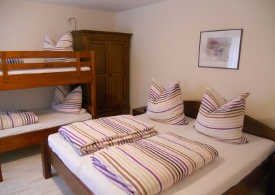 zweites Schlafzimmer im Ferienhaus 4, Ferienhäuser Vorwachs in Goyatz am Schwielochsee