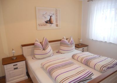 Schlafzimmer im Ferienhaus 4, Ferienhäuser Vorwachs in Goyatz am Schwielochsee