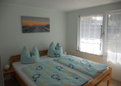 Schlafzimmer im Ferienhaus 5, Ferienhäuser Vorwachs in Goyatz am Schwielochsee