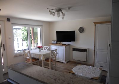 Wohnzimmer mit Essecke im Ferienhaus 5, Ferienhäuser Vorwachs in Goyatz am Schwielochsee