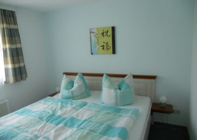 Schlafzimmer 1 Ferienhaus 1, Ferienhäuser Vorwachs in Goyatz am Schwielochsee